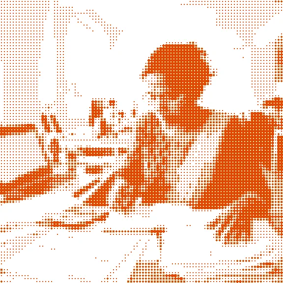 Comic panel: Priya going through papers at her desk