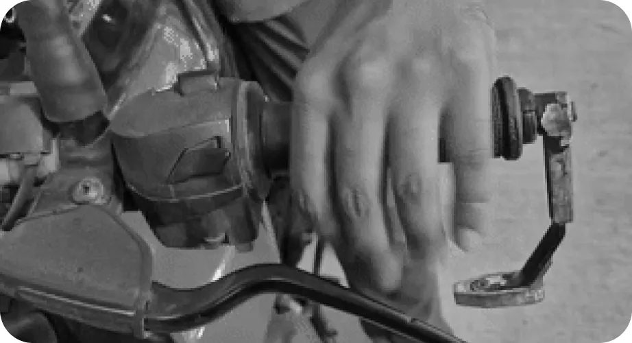 A hand wrapping all four fingers and thumb around the grip